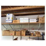 Two shelves of electrical supplies, we’re assuming boxes are labeled accordingly