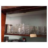 Shelf of drinking glasses