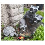 Concrete racoon family and concrete tortoise
