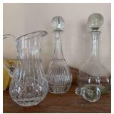 Two decanters and a pitcher