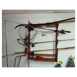 Dip net, gun rack, fishing poles, ice augers, recurve bow