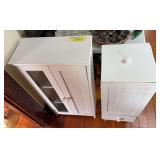 Two small cupboards 9x19x36 and 12x12x32 One on right is probably a trash receptacle