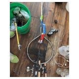 New dip net, fishing poles and bucket of tackle