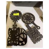 4 cast iron trivets