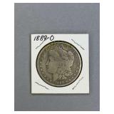 Morgan Silver dollar 1889 O Obverse side stained