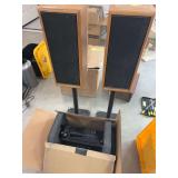 Denon integrated network, AV receiver, and two infinity speakers on stands