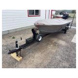 1982 14 foot aluminum fishing boat, trailer and brand new Tohatsu 20 hp motor with tiller handle, power trim and electric start