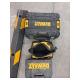 Three empty DeWalt tool containers