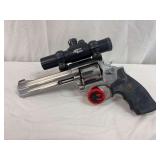 Smith & Wesson 357 Magnum, serial number AWN1990 M686–1, with Tasco pro point scope