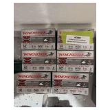Six cases of Winchester 12 gauge shotgun shells