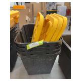 Four small black storage totes with lids