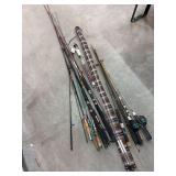 Large assortment of fishing poles