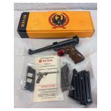 Ruger .22 caliber long rifle Mark 2 Target, serial number 19–21485 with box, paper manual, two extra sets of grips and seven magazines