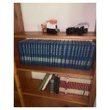 Many reference books and a little decor