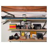 Cameras, projector screen, binoculars