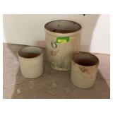 Three crocks includes a Red Wing 6 gallon w large chip inside