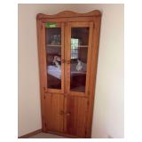 14D x 30L x 70H corner cupboard and contents Glass is cracked on one pane
