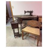 Treadle sewing machine, small humidor like table and bench All have been exposed to water