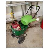 Scott’s broadcast spreader, metal sprayer, and watering can