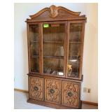 One piece lighted glass front hutch w two lower doors 14D x 47L x 80H
