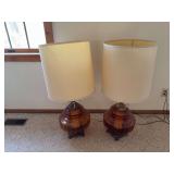 Two very swanky table lamps w amber glass bases