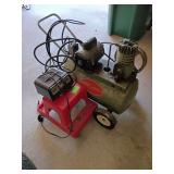 Campbell Hausfeld air compressor, rolling shop stool and battery charger