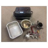 Enamel turkey roaster, hand crank sieve, apple peeler, meat grinder, and teapot