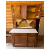 Gorgeous vintage oak Hoosier cupboard with flour and sugar dispensers, original spice racks in door and revolving spice rack in the center plus pull out countertop