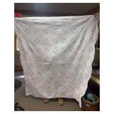 Antique embroidered double wedding ring quilt