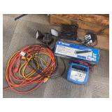 Extension cords, solar light, ceramic heat and fan, tile cutter and battery charger