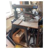 Craftsman radial arm saw on rolling cart