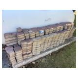 Concrete pavers, 80 flat sides, 208 middle pieces