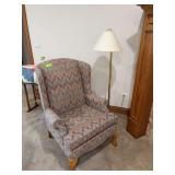 Winged arm chair by Best Chairs and floor lamp