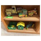 John Deere items includes cast iron tractor, wooden toy, bird house
