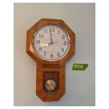 On walls of dining room includes Regulator Lone Oak wall clock, flower decor, cross decor
