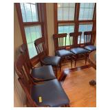 Six straight back dining chairs
