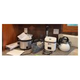 Kitchenwares includes small crockpot, tea kettle, hand mixer, electric knife, etc