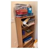 Modern bookcase w puzzles, tins, crafts, etc