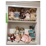 Two shelves porcelain dolls