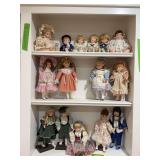 Three shelves porcelain dolls