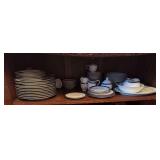 Uncounted, unsorted Nikko fine china, sapphire pattern