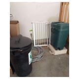 Hose, garbage cans, dog gate