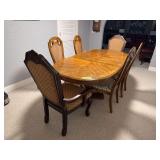 64” dining table with two 18” leaves with 4 matching chairs and 2 captains chairs