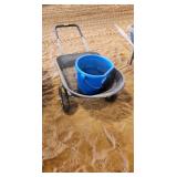 Small poly wheel barrow and feed bucket