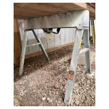 Pr folding metal sawhorses and 6 wolmanized 2x6x16 boards