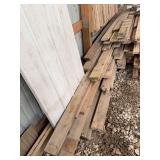 Large pile of dimension lumber from 4