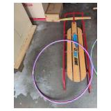 Sno Hawk toboggan and hula hoop (send video of you using them together)