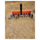 Pull behind punch aerator