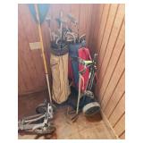 Golf clubs and 2 hand carts