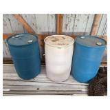 3 plastic barrels